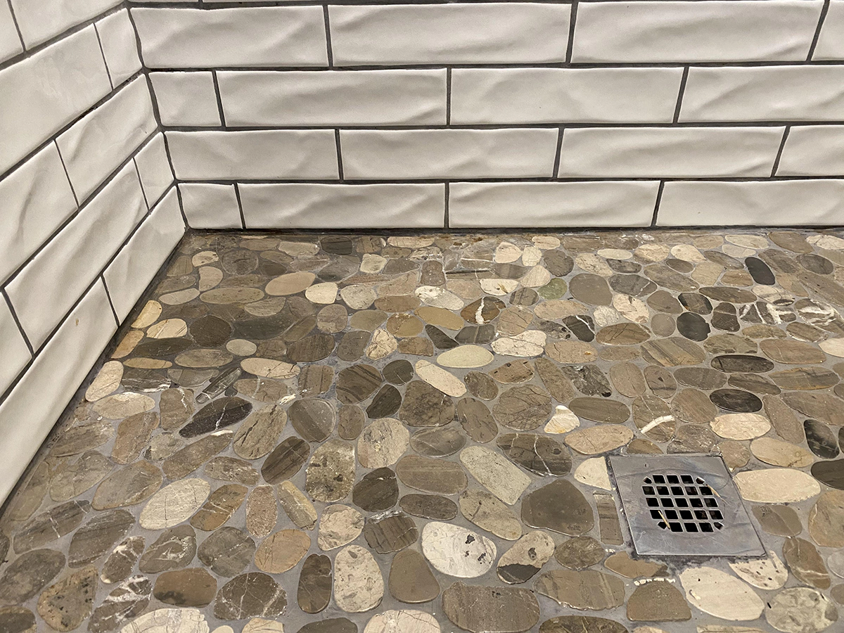 water coming up through basement floor after heavy rain