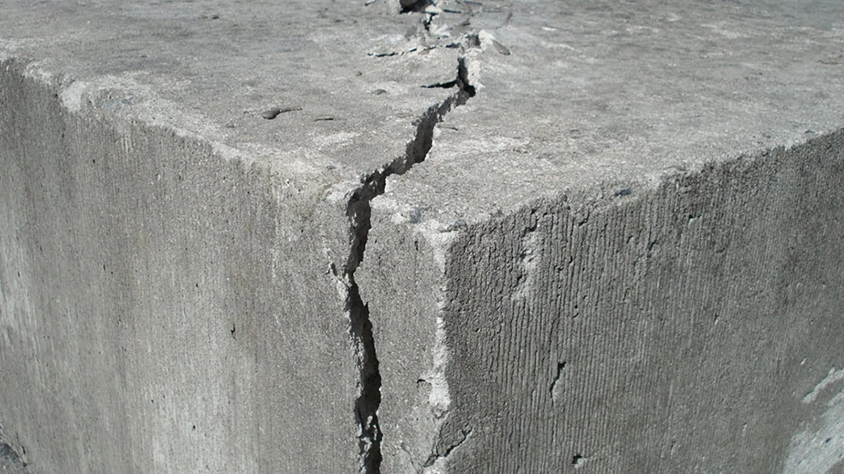 water coming up from basement floor cracks